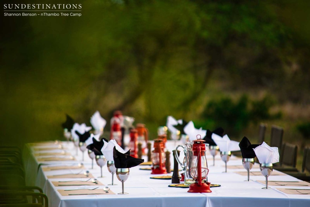 A table set among the bush greenery