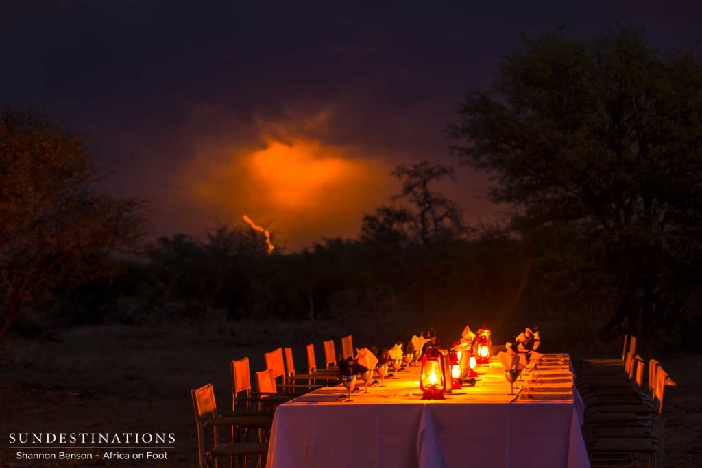 Lightning strikes in the background just before this bush braai had to be packed up to avoid a storm!