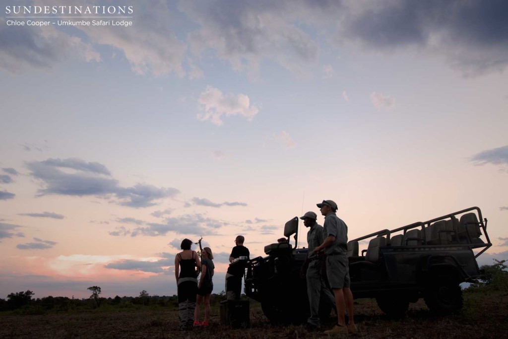 Umkumbe guests enjoying an intimate moment with the sunset in the middle of the Sabi Sand bush!