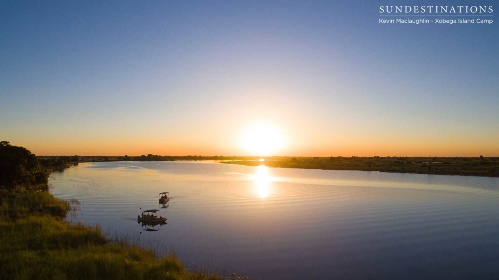 The sun begins to set as Xobega Island guests enjoy the view from the boat