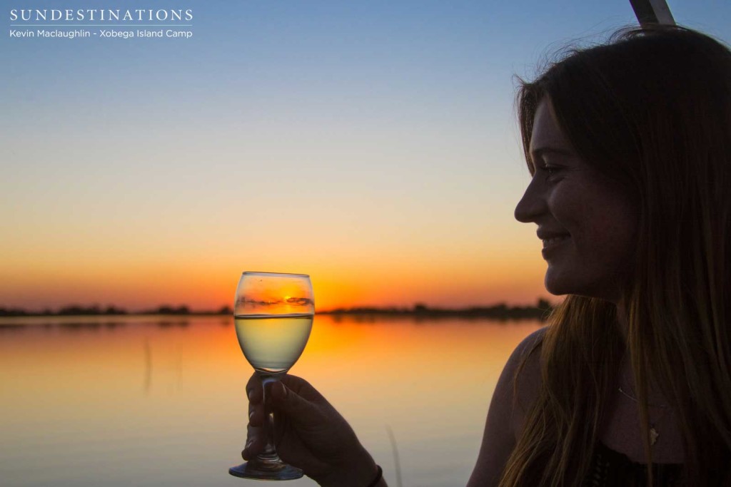 Toasting the Delta sunset from the cradle of the boat at Xobega Island