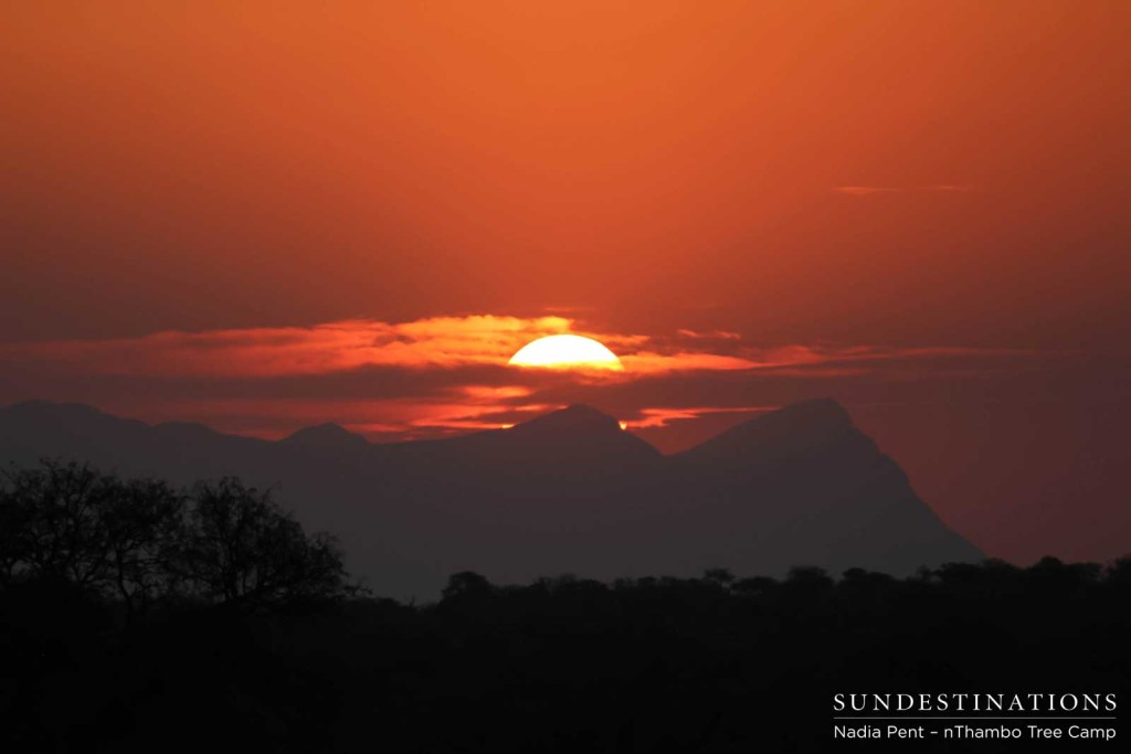 A lava like sunset creates the backdrop for the Drakensberg Mountains